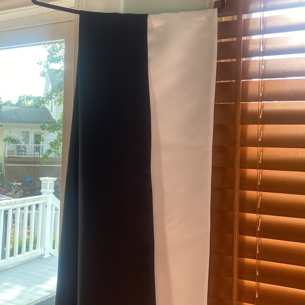 Black and white satin wrap like cover up.  One side is black and one is white.